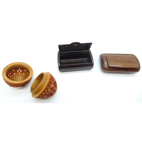 1125 - A Bakelite snuff box, one other snuff box and an egg shaped carved pomander