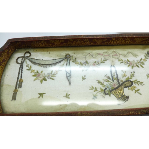 1127 - A small silver tray, Birmingham 1922, 49g, a silver nail buff, Birmingham 1911 and an embroidered si... 