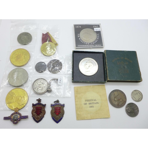 1128 - A collection of coins and medallions