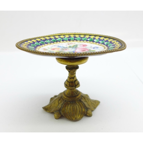 1129 - A miniature oval stand, gilt metal and enamelled with painted flowers, a/f