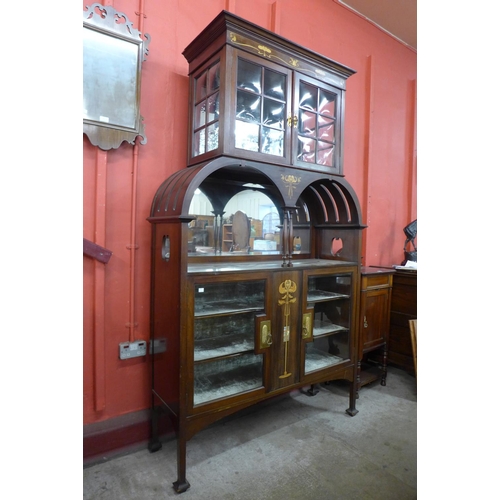 86 - An Arts and Crafts inlaid mahogany side cabinet