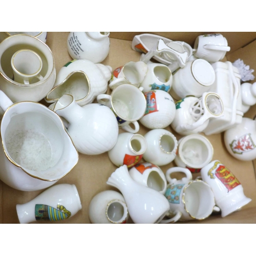 719 - Over forty pieces of crested china, (small chip on bulldog paw)