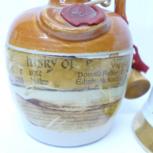 811 - Two decanters, Scottish Whisky, marked Donald Fisher Ltd., Edinburgh and a Bell's 1986 Royal Wedding... 