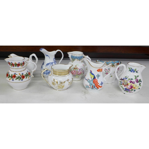 818 - A collection of twelve Royal Worcester jugs, The Historic Jugs, with certificates