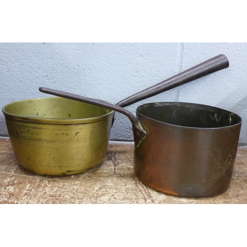 832 - Two copper and brass saucepans and one other pan