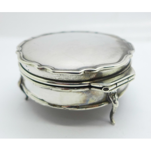 856 - A silver jewellery box, 7cm diameter