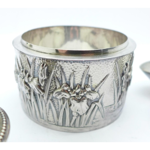 887 - Three items of hallmarked silver and a white metal pot with Chinese mark, 255g