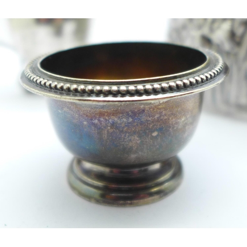 887 - Three items of hallmarked silver and a white metal pot with Chinese mark, 255g