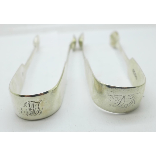 891 - Two pairs of silver sugar bows, 77g