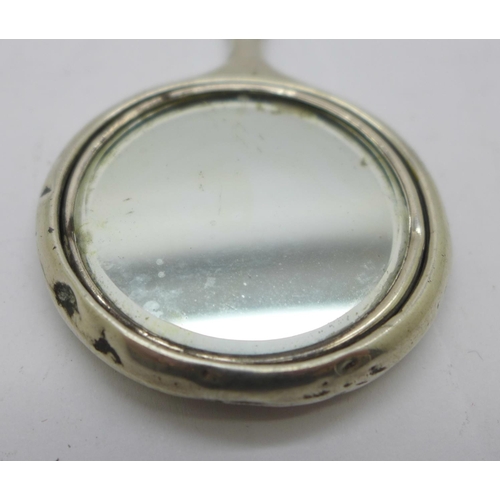 892 - A silver miniature hand mirror on a silver chain