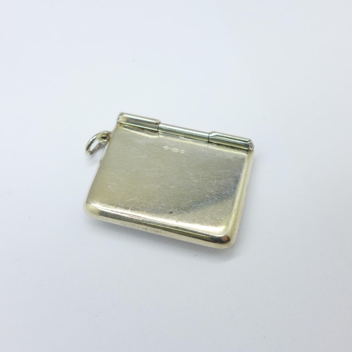 906 - A silver stamp purse, 8g