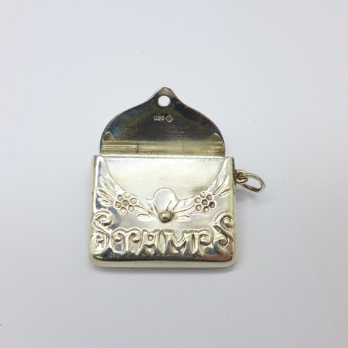 906 - A silver stamp purse, 8g