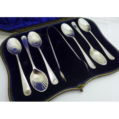 912 - A cased set of six silver teaspoons with sugar bows, 96g