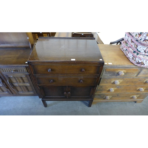 306 - An Art Deco oak tallboy