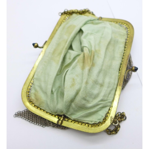 920 - A mesh purse and eleven thimbles including Darcas