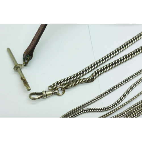 945 - A white metal guard chain, a silver Albert, 18g, and a leather Albert