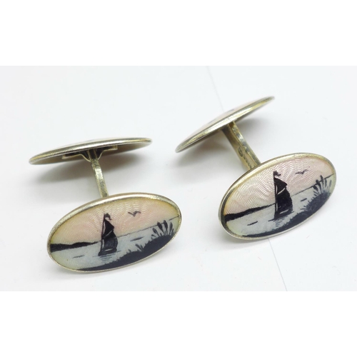 953 - A pair of Scandinavian silver gilt double enamel seascape scene cufflinks