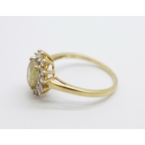 984 - A 9ct gold and Welo opal cluster ring, 1.7g, M