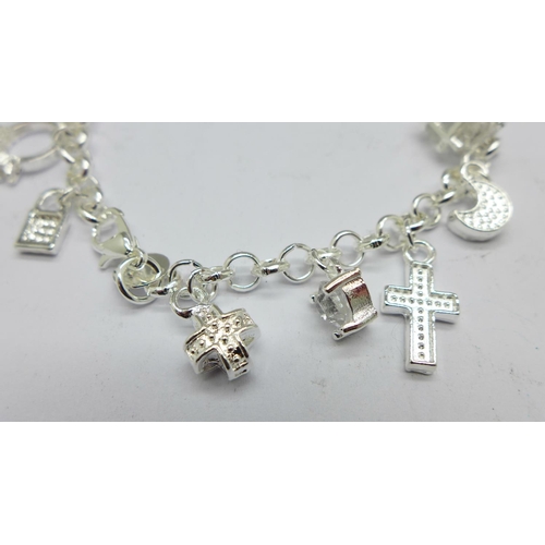 987 - A silver charm bracelet