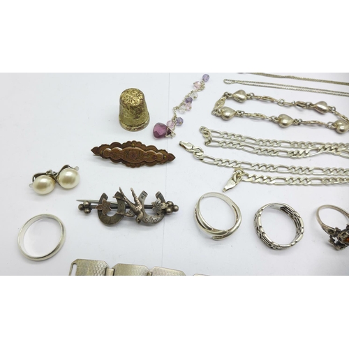 996 - A silver bracelet, other silver jewellery, two metal brooches and a silver thimble, (some a/f includ... 