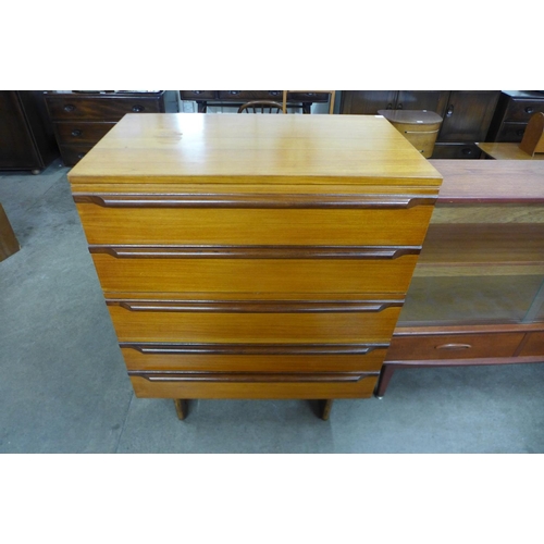 132a - A teak chest of drawers