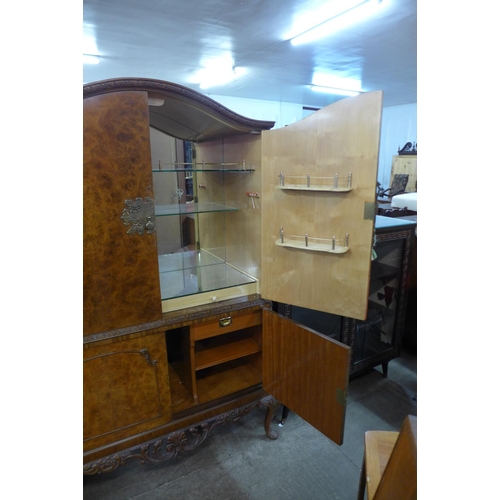 200 - A burr walnut fitted cocktail cabinet