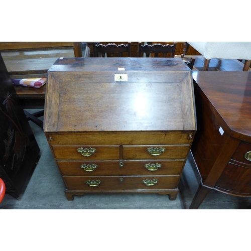 202 - A George II oak bureau