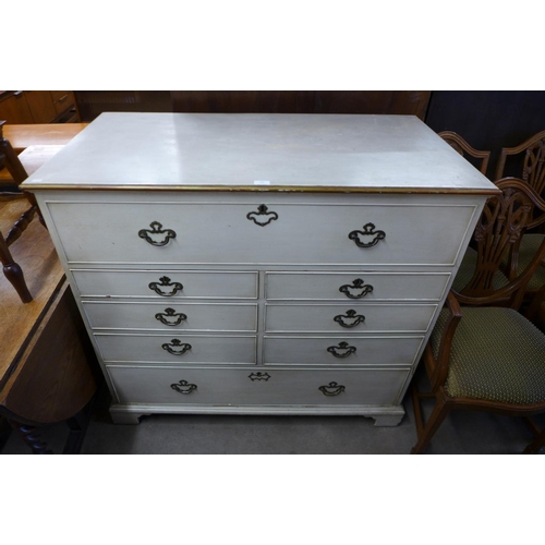 236 - A George III painted oak chest of drawers (top adapted to lift up)