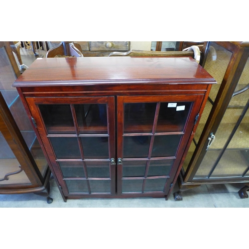 244 - A mahogany two door bookcase