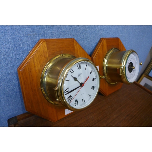 28 - A Schatz marine aneroid barometer and matching wall clock, mounted on oak octagonal plinths