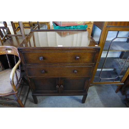 306 - An Art Deco oak tallboy