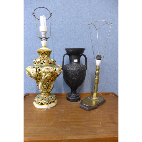 467 - An Italian porcelain table lamp, a brass table lamp and a Romanesque painted vase