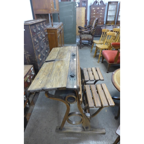 50 - A Victorian pine and iron school desk