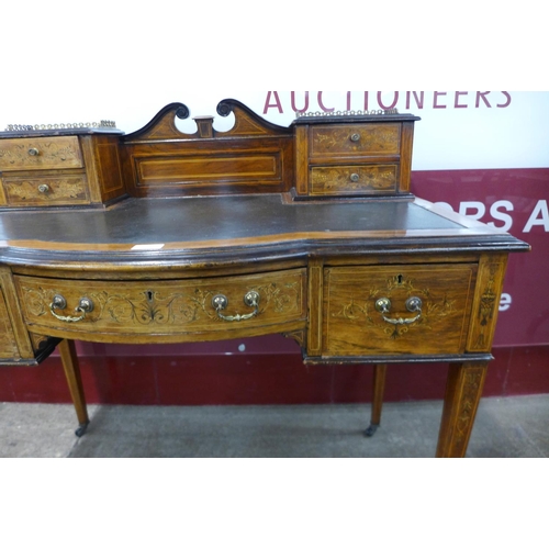 83 - A Victorian inlaid rosewood bonheur du jour