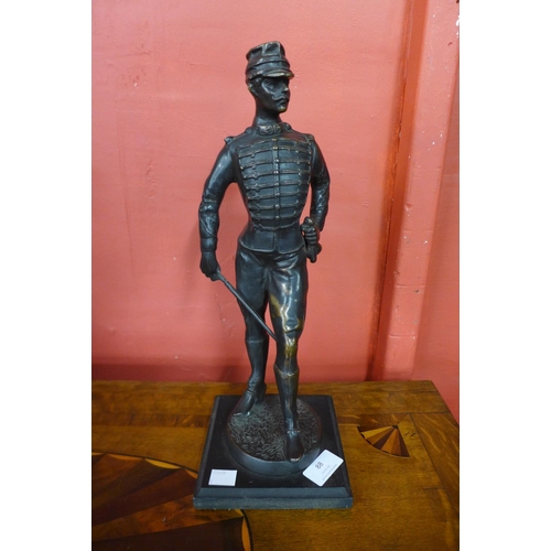 88 - A bronze figure of a French soldier, on black marble socle