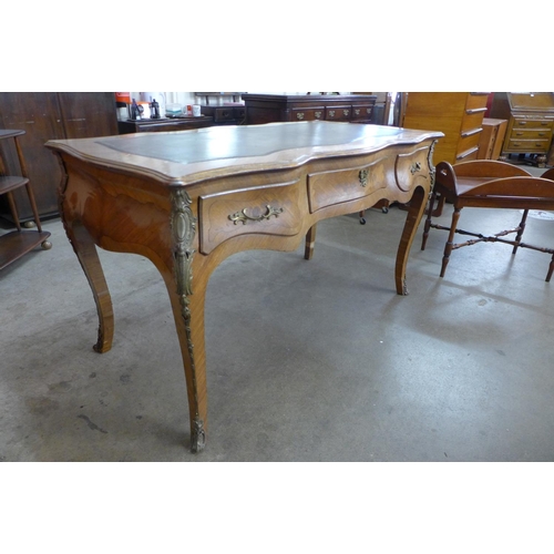 94 - A French Louis XV style inlaid rosewood and gilt metal mounted bureau plat