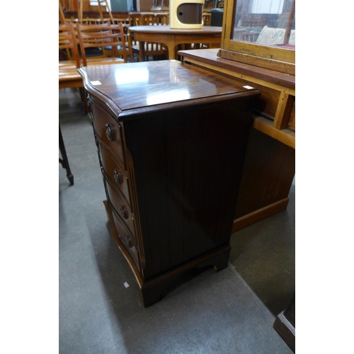 107 - A small mahogany serpentine chest of drawers