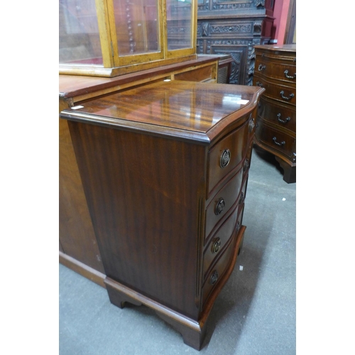 107 - A small mahogany serpentine chest of drawers