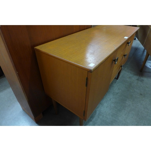 138 - A small teak sideboard