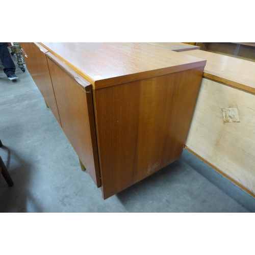 140 - A teak sideboard