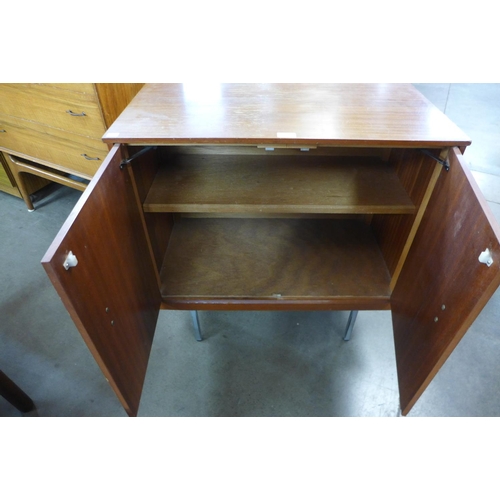 151 - A teak two door cabinet