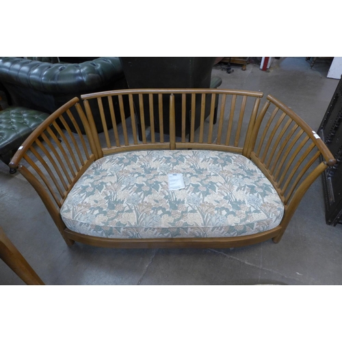 164 - An Ercol Golden Dawn elm settee