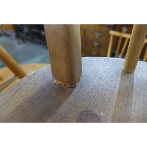 166 - An Ercol Blonde elm Windsor chair and one other