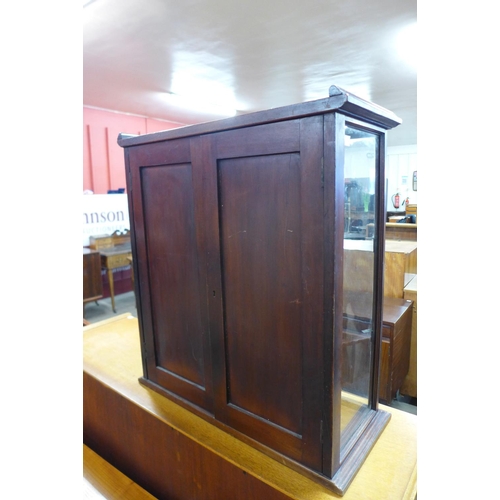 197 - A Victorian mahogany counter top shop display cabinet (lacking glass shelves)