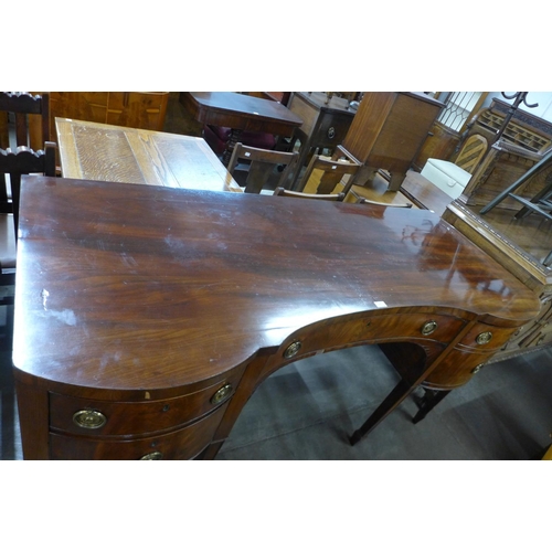 203 - A George IV mahogany breakfront sideboard