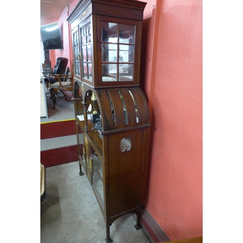 86 - An Arts and Crafts inlaid mahogany side cabinet