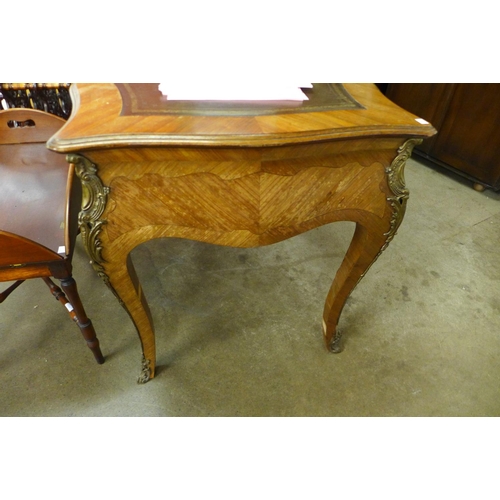 94 - A French Louis XV style inlaid rosewood and gilt metal mounted bureau plat