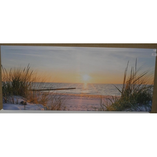 3083 - A beach scene print on canvas (50 x 120cm) * this lot is subject to VAT