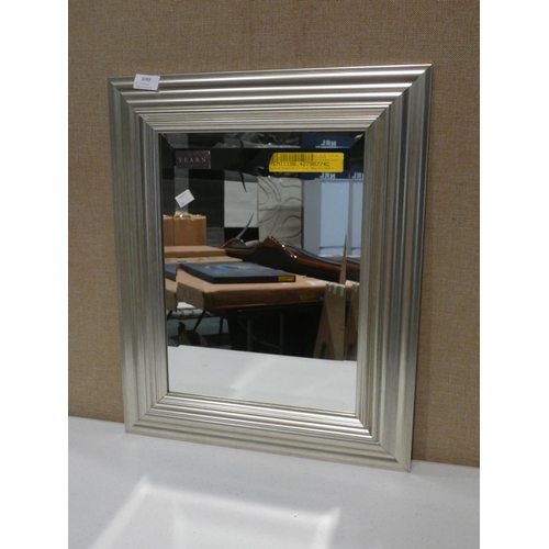 3088 - A gilt effect Burdick wall mirror (46 x 56cm) * this lot is subject to VAT