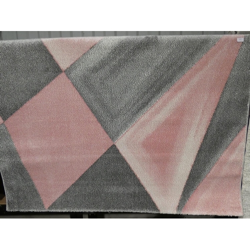 3101 - A pink/silver patterned rug (160 x 230cm) * this lot is subject to VAT (11 Nov)